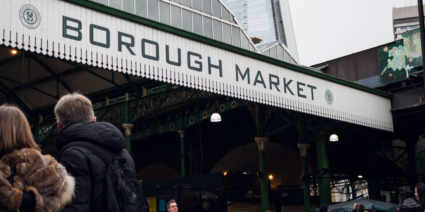 Borough Market railway arches and market entrance in London